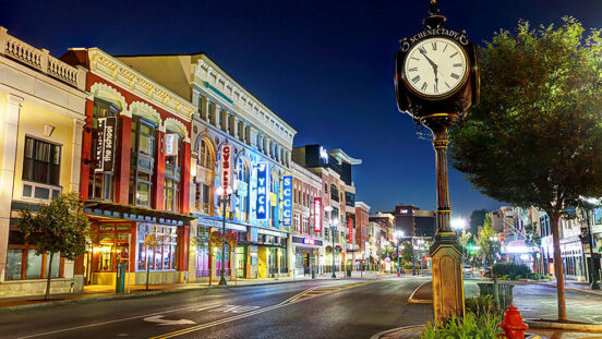 Downtown image of Schenectady New York was clock and colorful buildings in the background