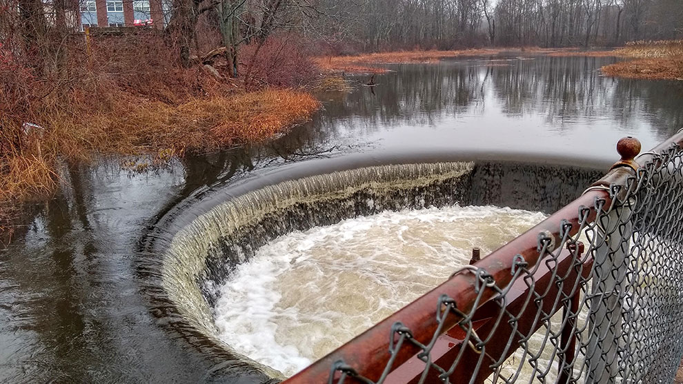 Integrated Water Infrastructure Vulnerability Assessment, image of water flowing through dam