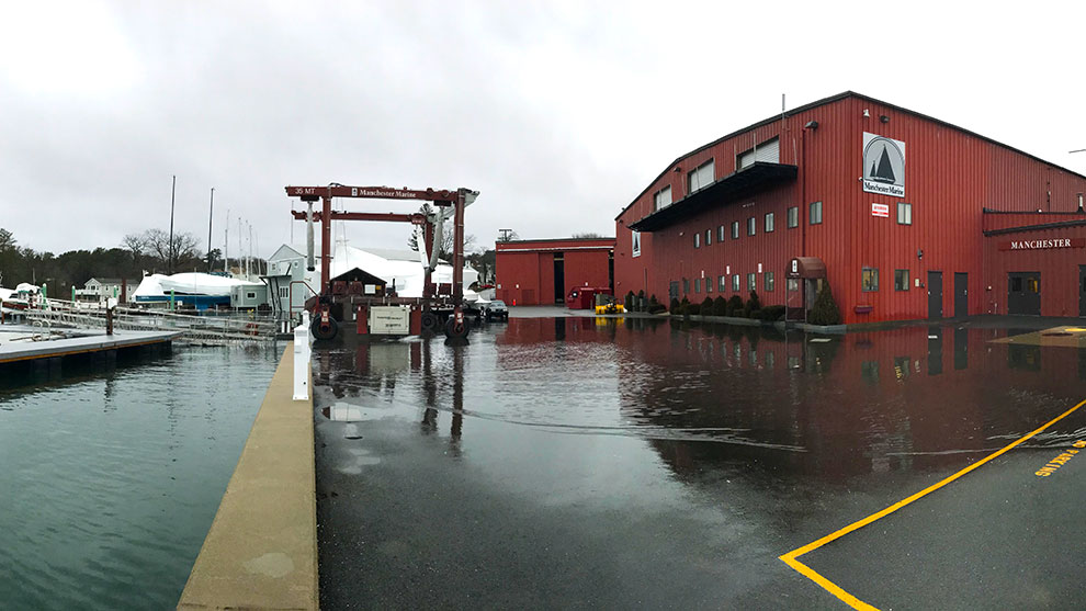 Flooded parking lot next to boat launch