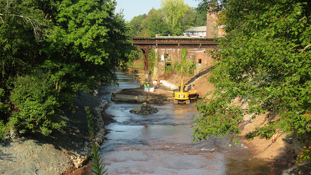 Excavator working in the river