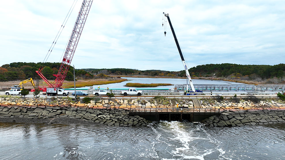 Side view of herring river with construction workers