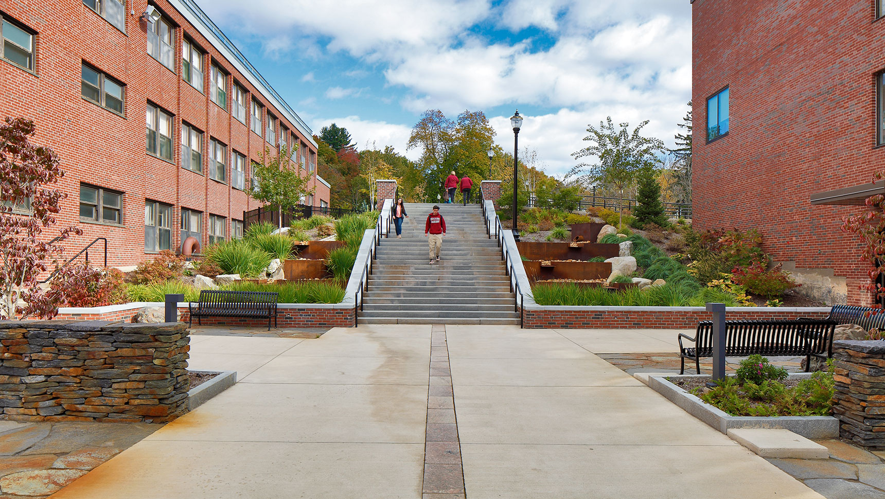 people walking down stairs at completed Morrill Science Center stairway