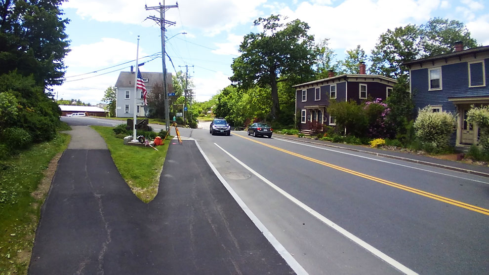 Newmarket street with cars driving by