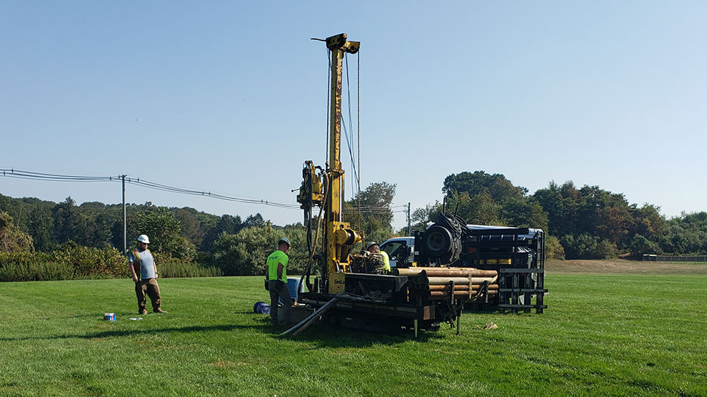 people working with equipment