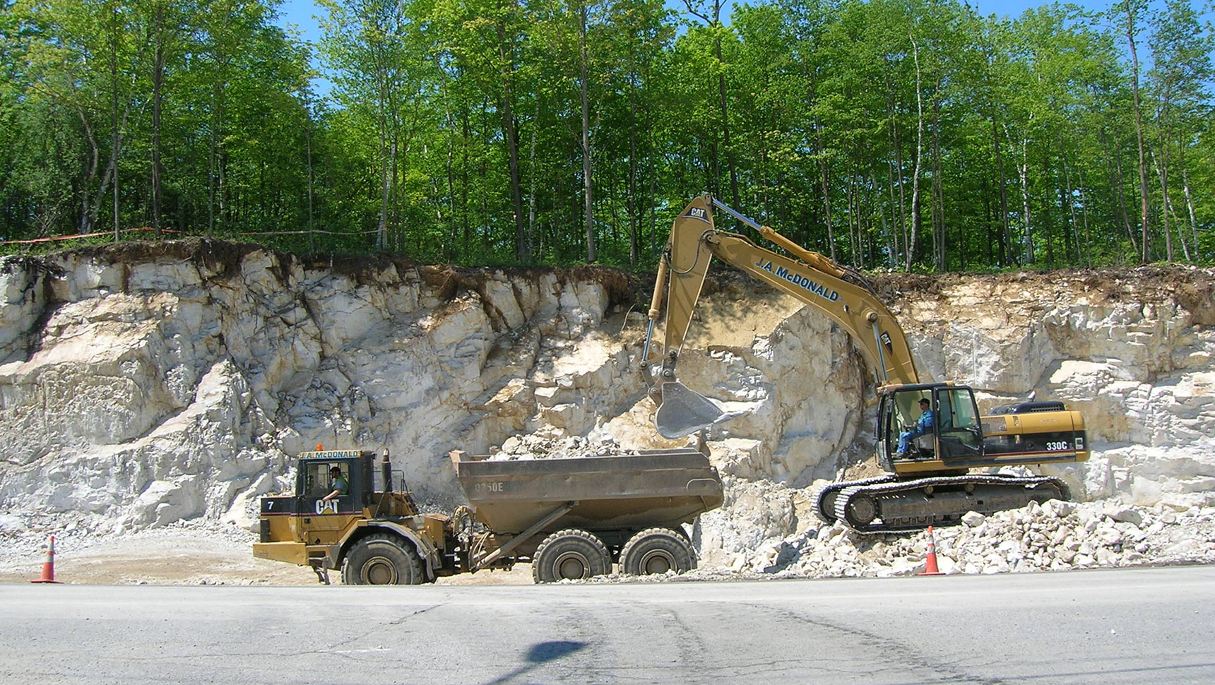 excavator and truck
