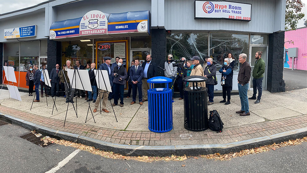 Norwalk Wall street project dedication with people standing on sidewalk